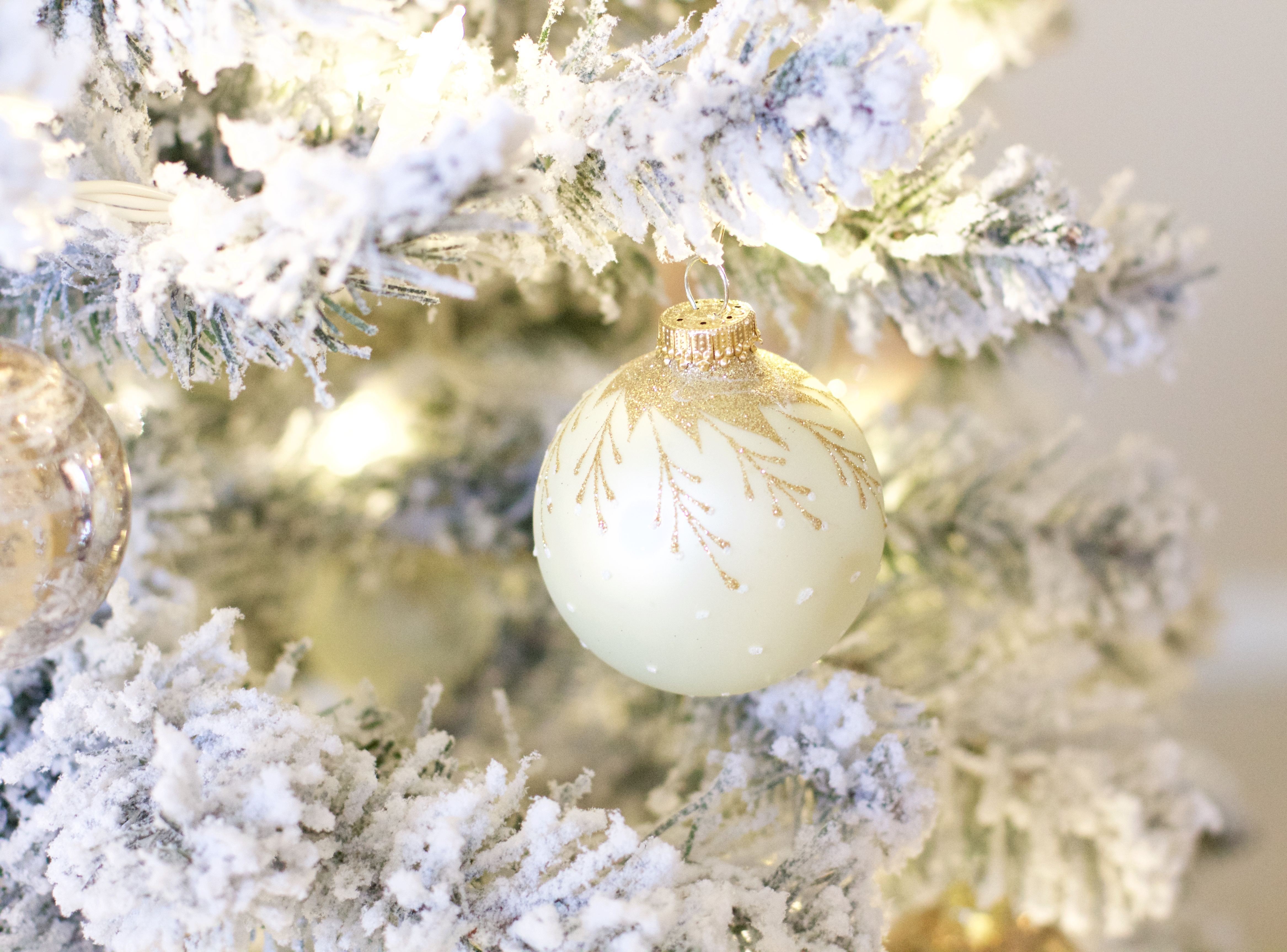 white and gold christmas ornaments